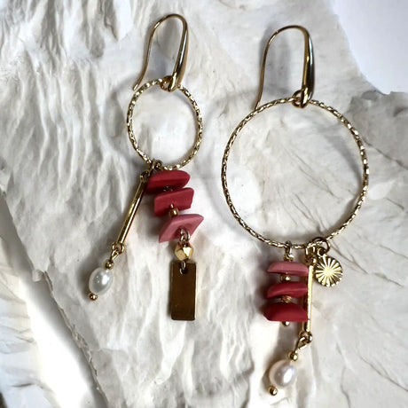 boucles d'oreilles pendantes roses