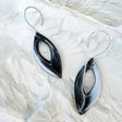 boucles d'oreilles pendantes marbrées en noir et blanc